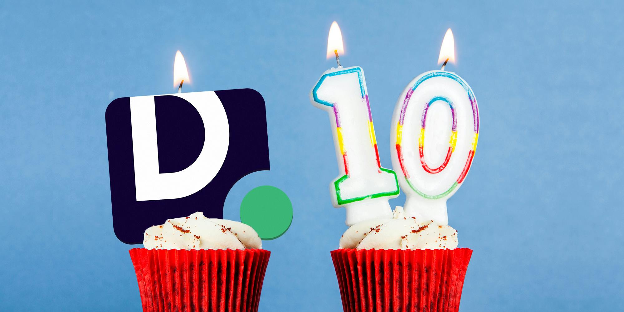 Daily Dot logo candle and Number 10 birthday candle in cupcakes against a blue background