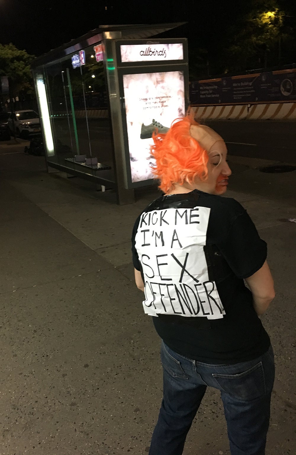 Kelsey Caine kick me sign