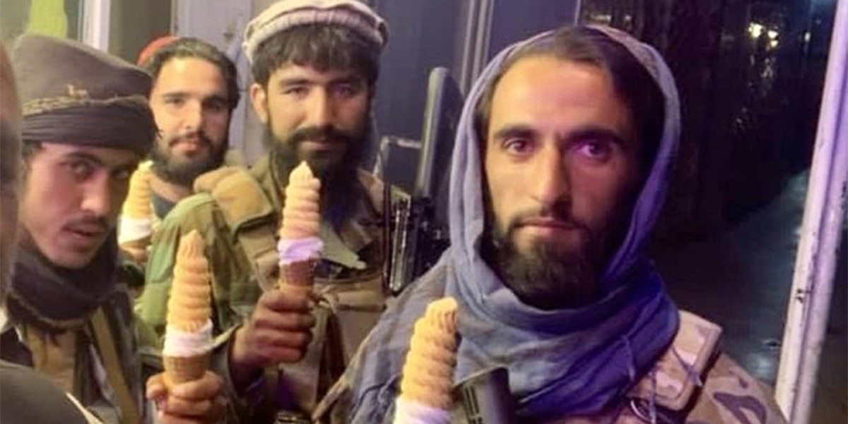 Taliban soldiers posing with ice cream cones