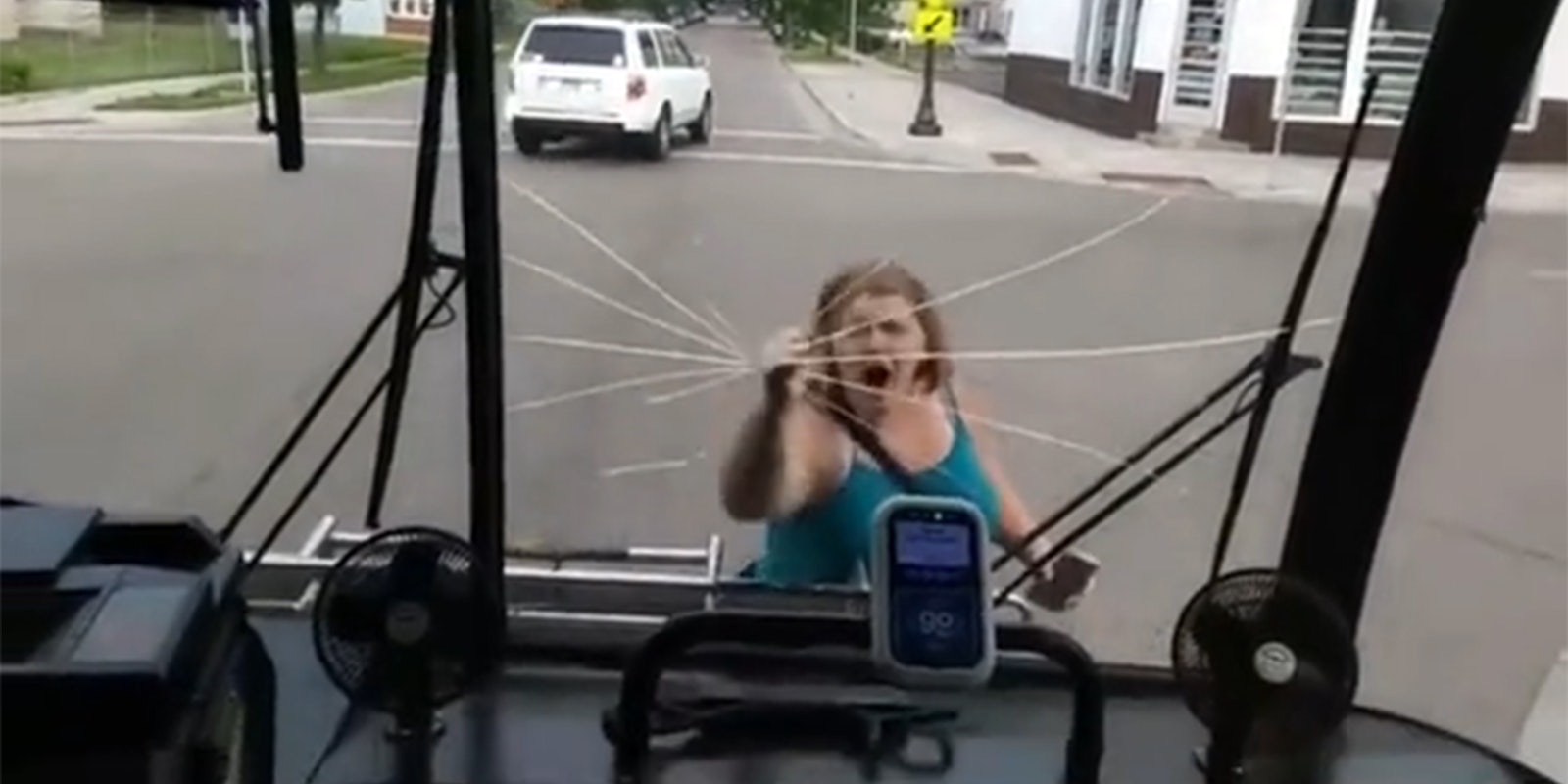 woman smashes bus window