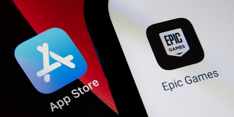 A smartphone with the Apple App Store icon next to an icon for an Epic Games app.