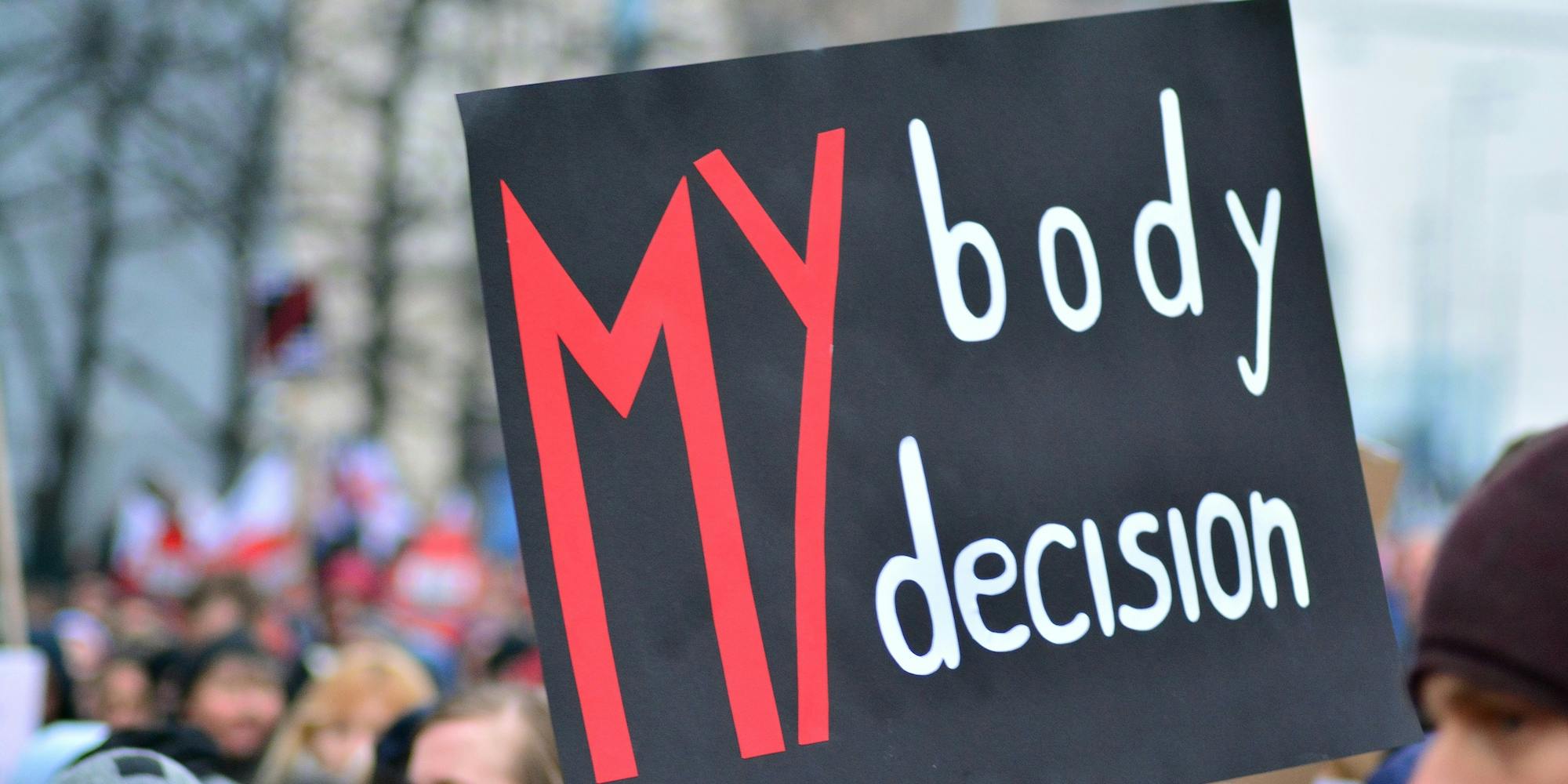 woman holding a pro-abortion sign