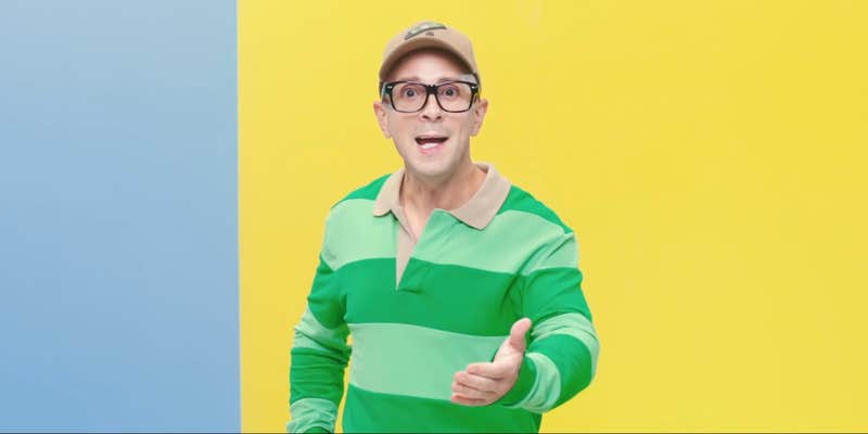 man wearing green striped shirt