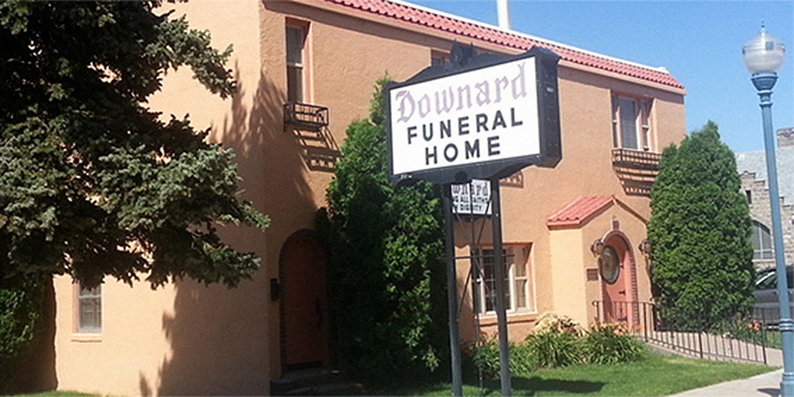 Downard Funeral Home sign outside building