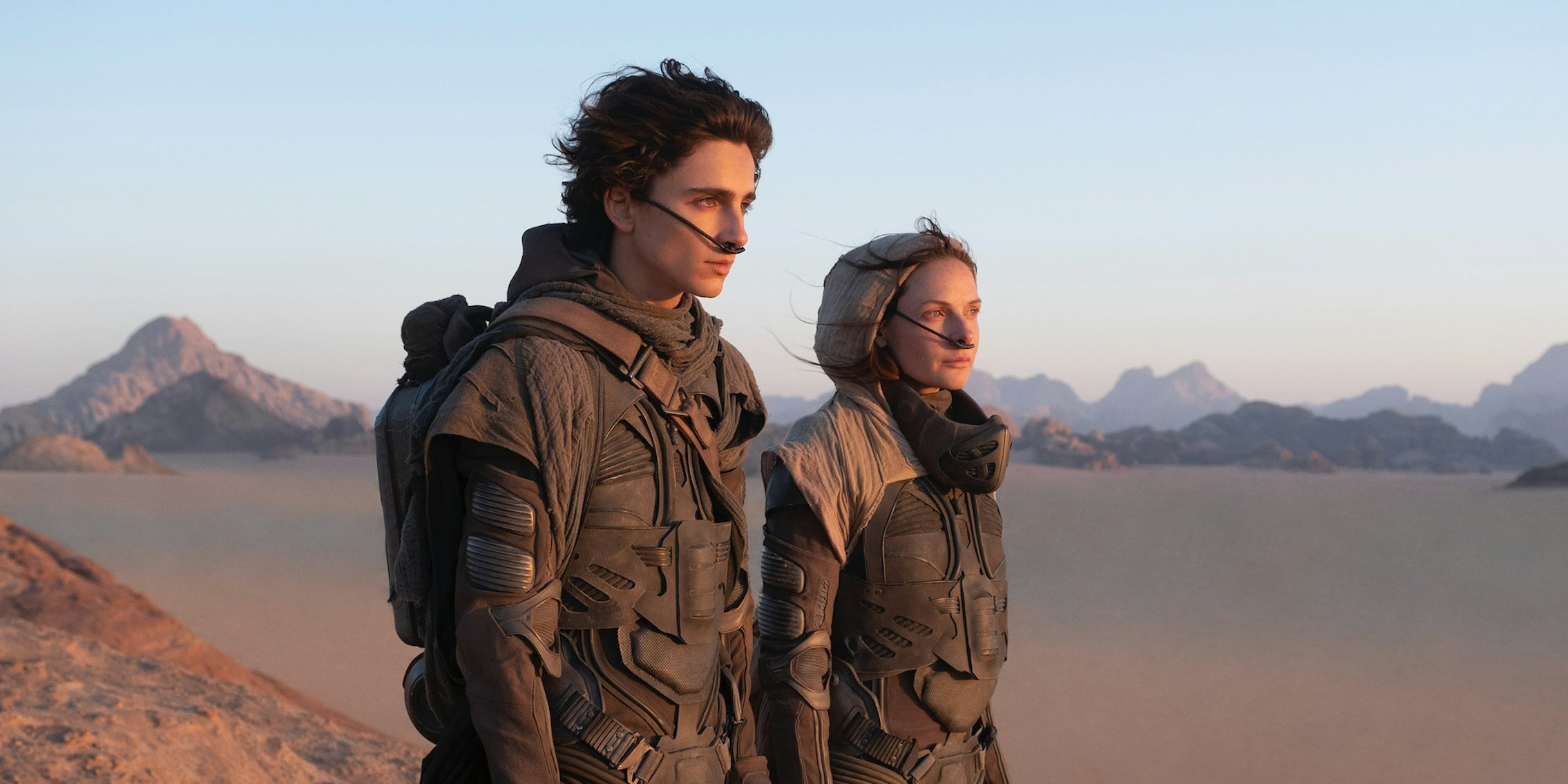 man and woman in stillsuits