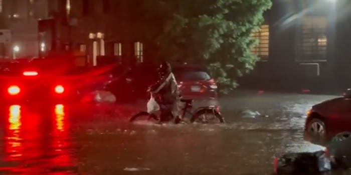 grubhub delivery on bicycle in flood