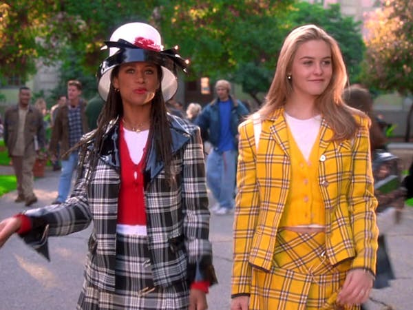 Dionne and Cher in complimenting plaid suit skirts from Clueless