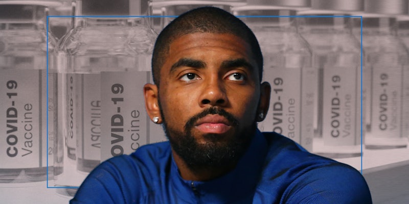 Kyrie Irving in front of COVID-19 vaccine vials
