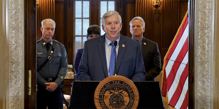 Missouri Gov. Mike Parson holding a press conference where he branded a journalist a 'hacker' for viewing the HTML source code of a government website.