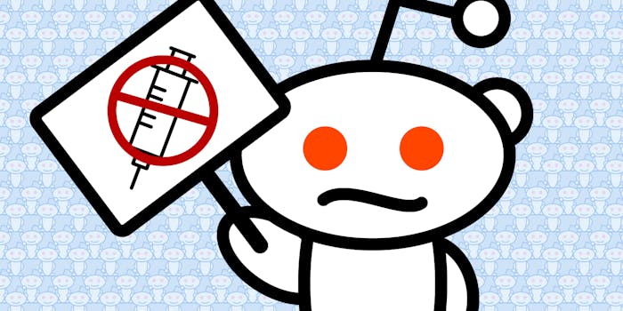 Reddit alien holding sign with "no" symbol over syringe