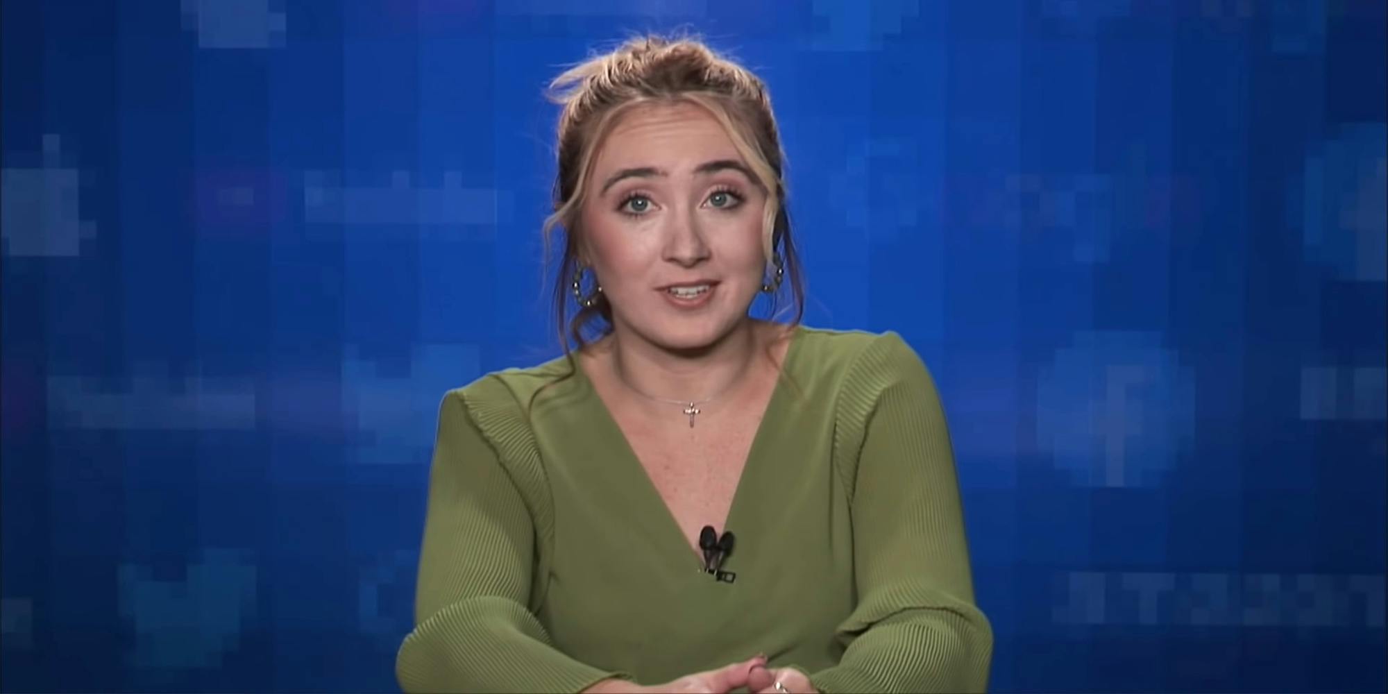 Young woman in green shirt with microphones