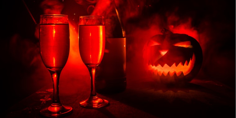 Two glasses of champagne and Jack-o-Lantern