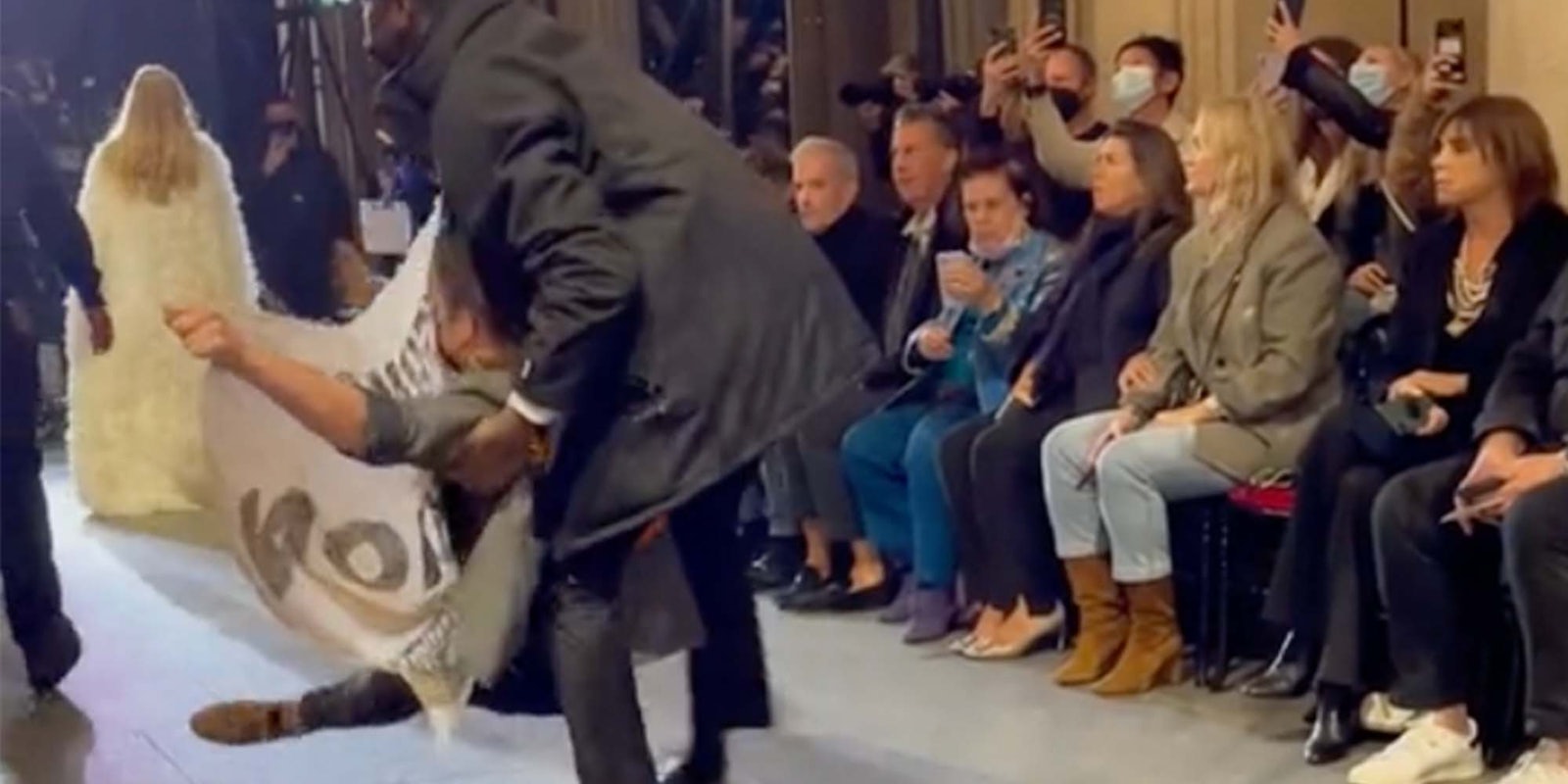 A protester that crashed the Louis Vuitton fashion show in Paris has become a big topic online.