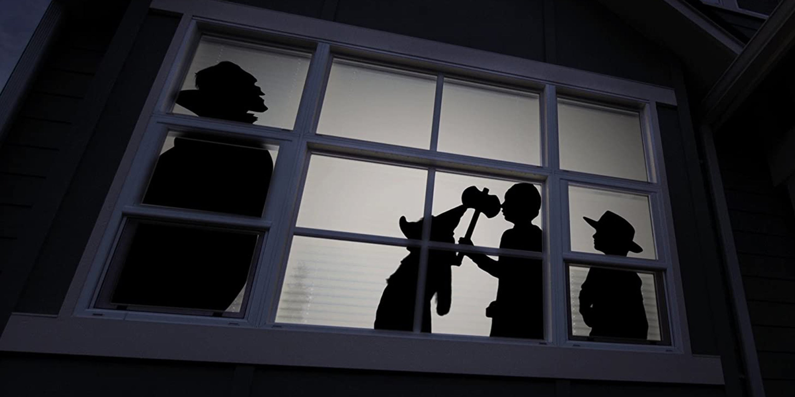 Dracula spooks trick o treaters projected onto window