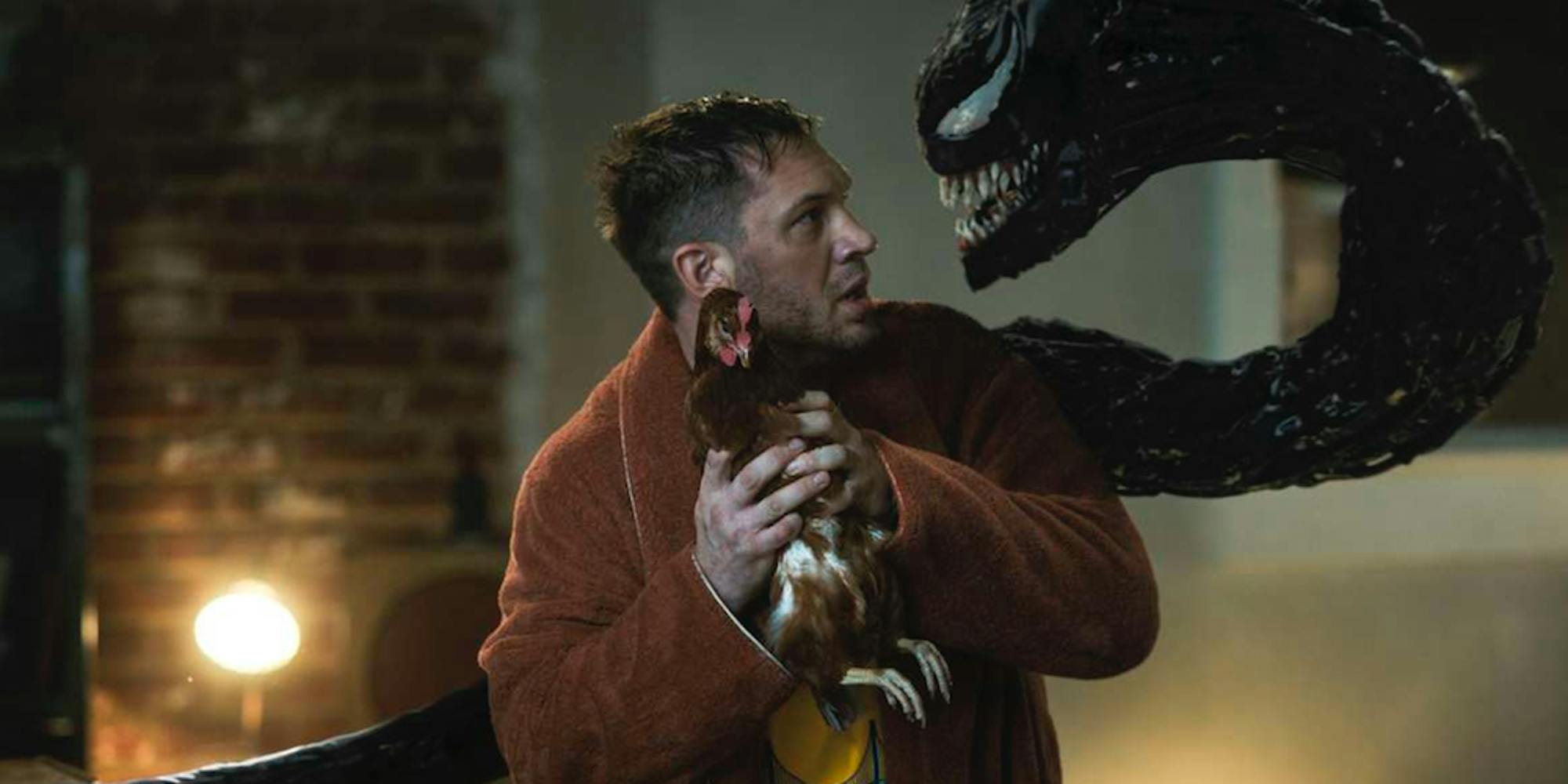 tom hardy holding a chicken