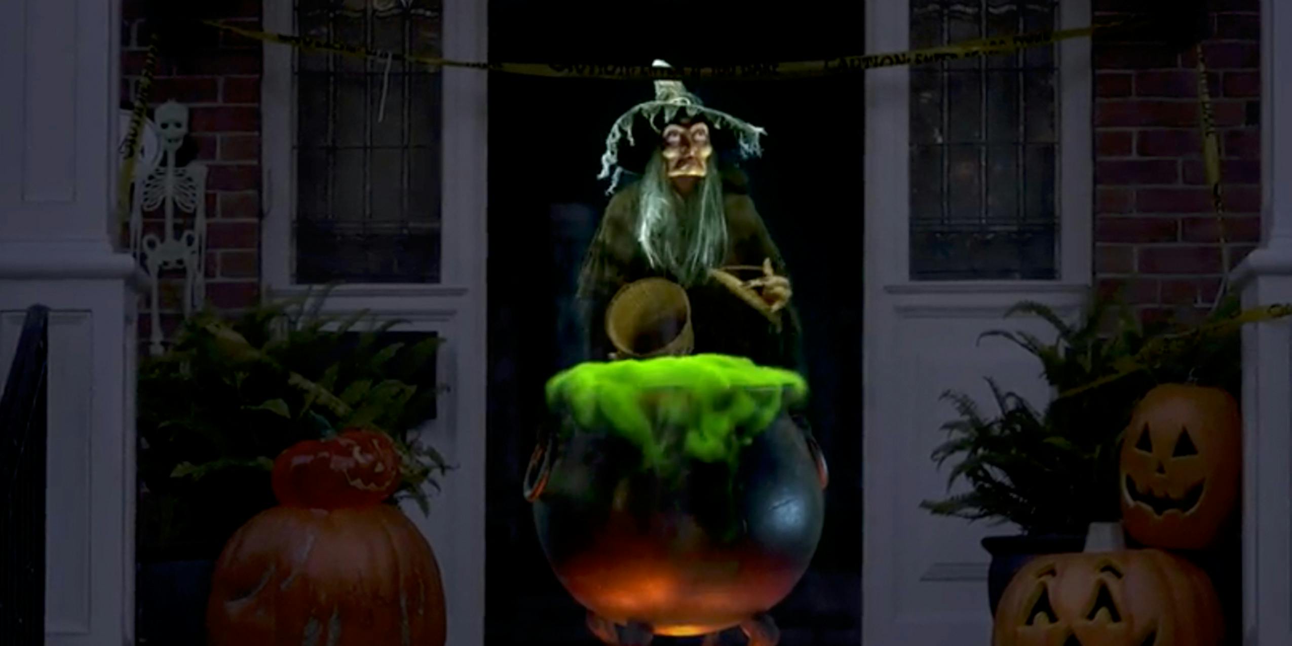 Charming witch projected into doorway