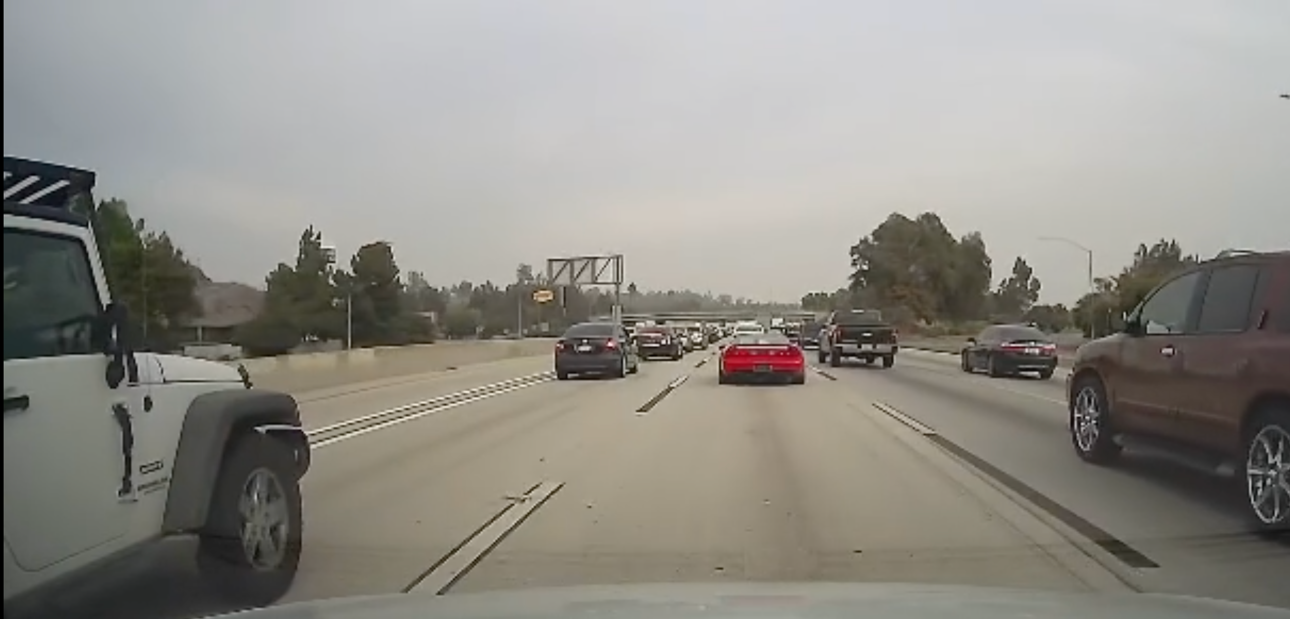 Karen Throws Drink at Car, Gets Served Instant Karma in Viral Video