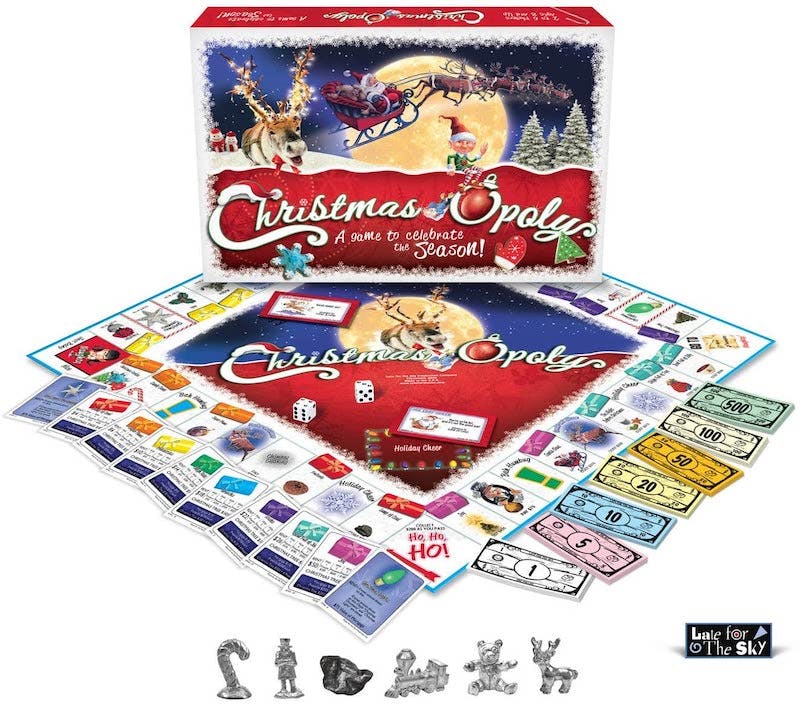 christmas-opoly board game, fake money, and pieces