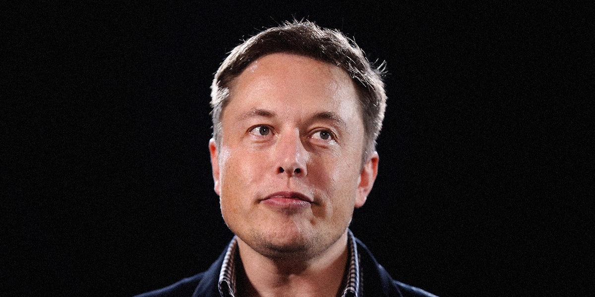 Elon Musk looking off camera.