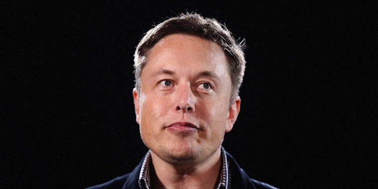 Elon Musk looking off camera.