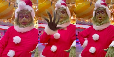 A man in a Grinch costume on video