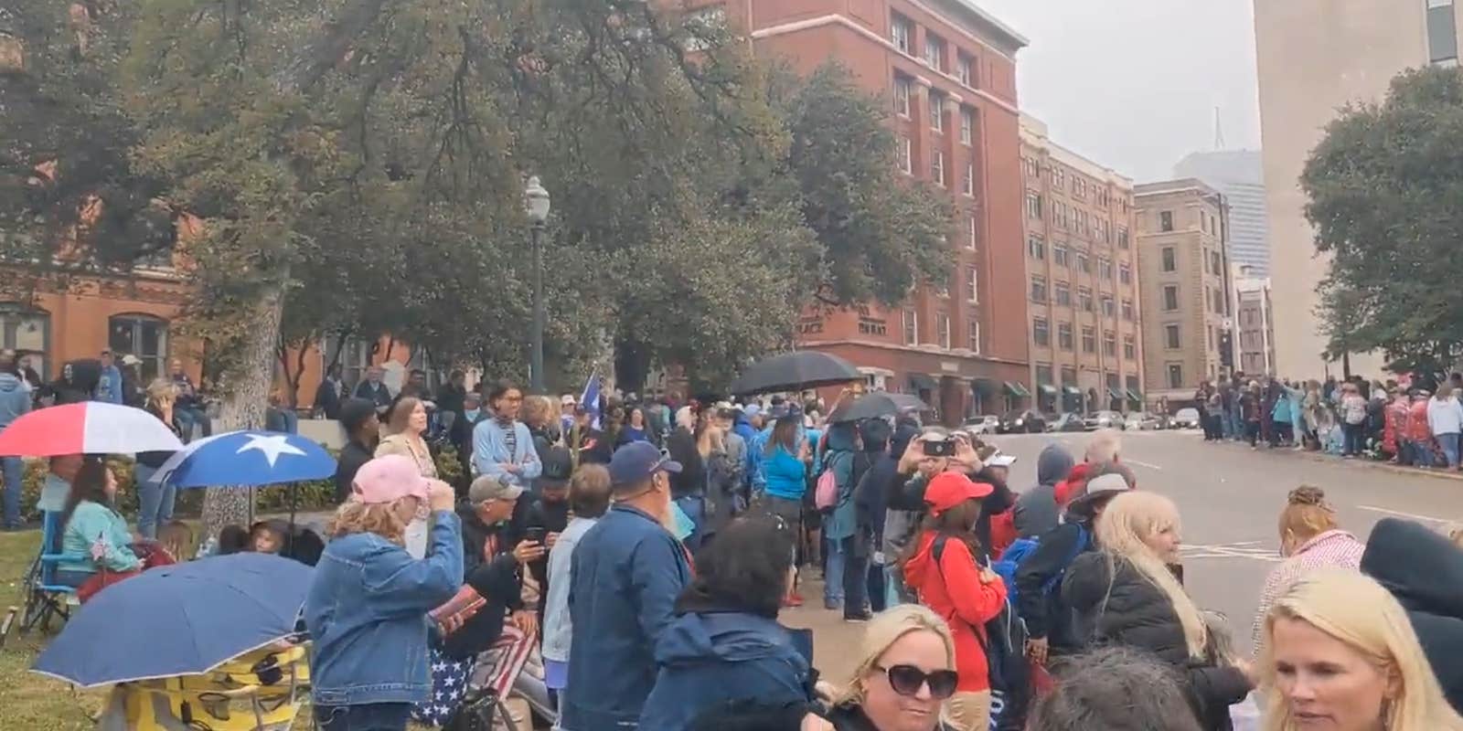 A group of QAnon believers gathered at Dealey Plaza in Dallas for a JFK Jr. event