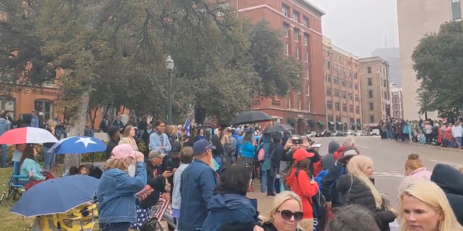 A group of QAnon believers gathered at Dealey Plaza in Dallas for a JFK Jr. event