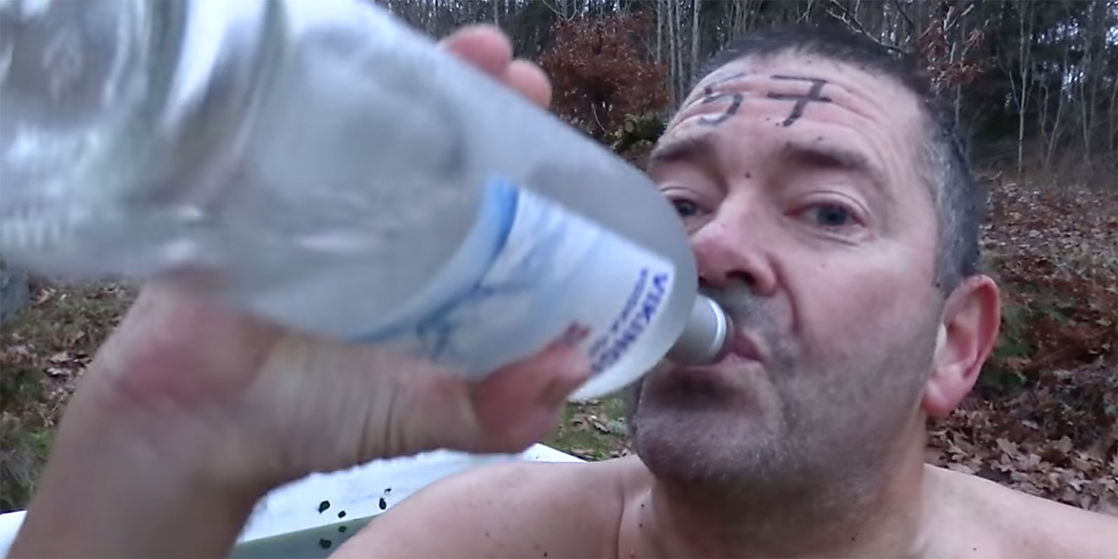 A man drinking vodka.