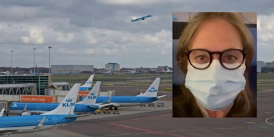 Multiple planes outside of an airport and a woman in a mask