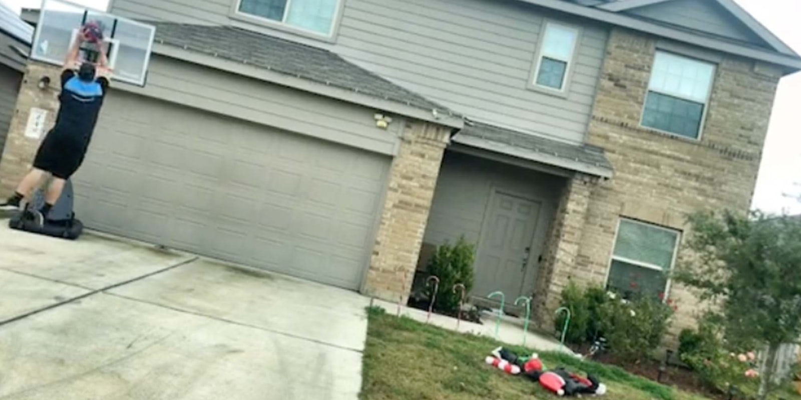 An Amazon delivery driver says he was fired after playing with a basketball in a customer's driveway.
