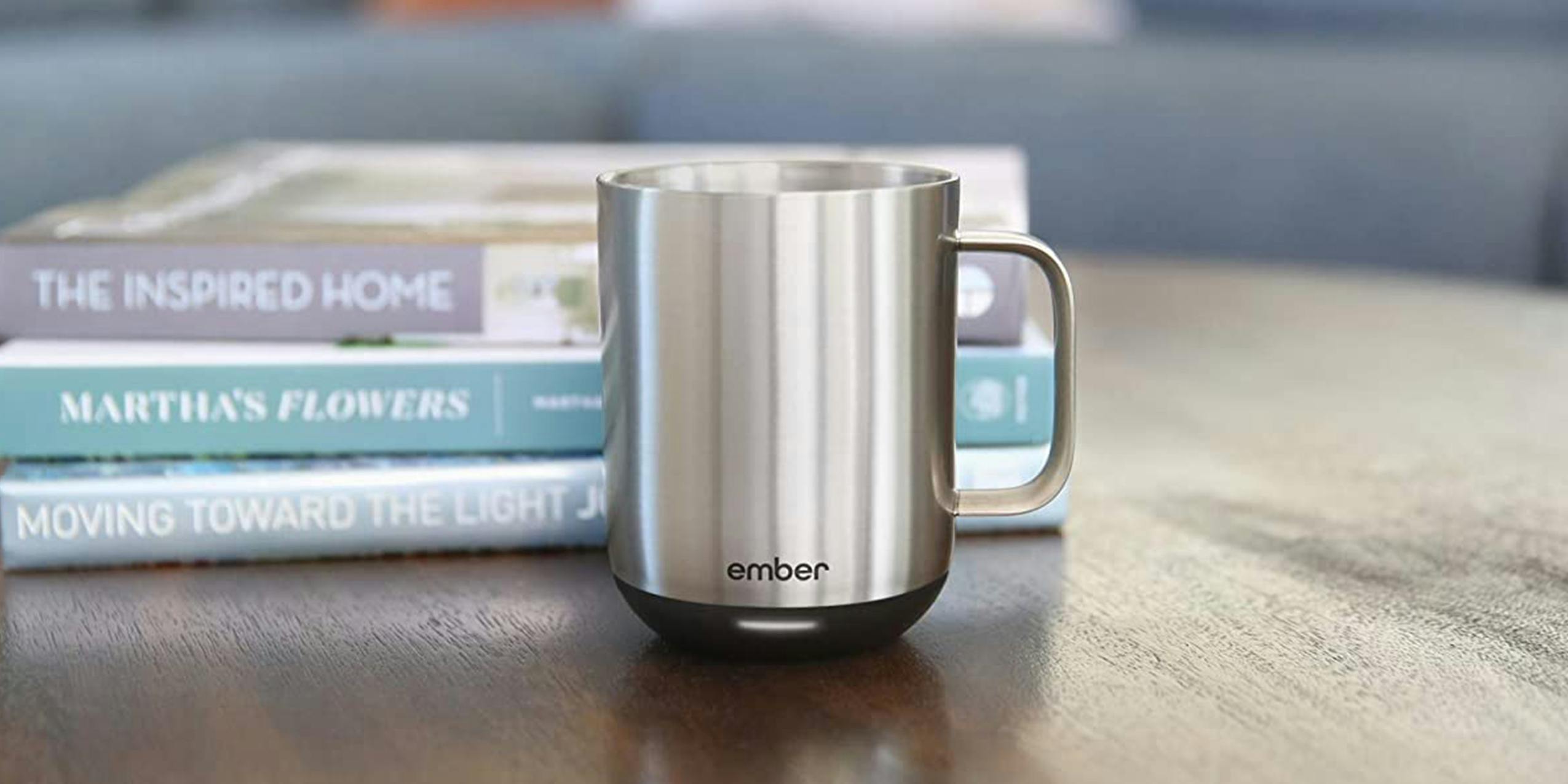 The Ember Mug placed on a coffee table.