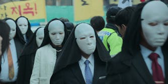 people wearing white masks
