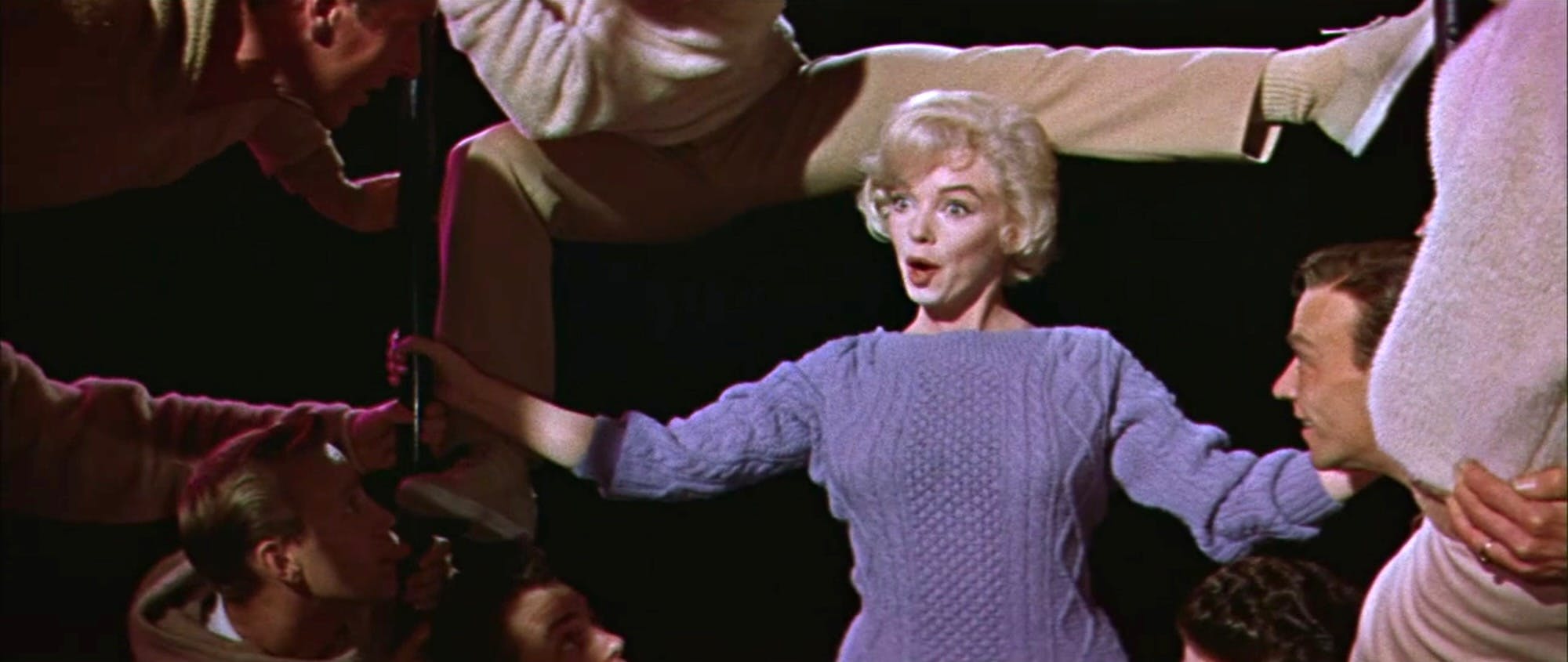 marilyn monroe in an aran sweater in let's make love