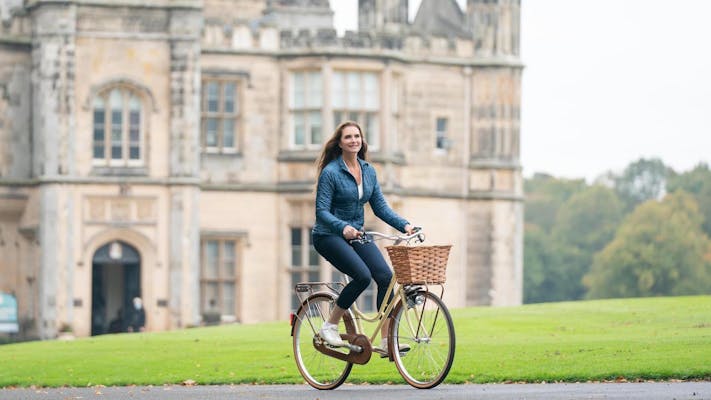 brooke shields riding bicycles in the castle at christmas