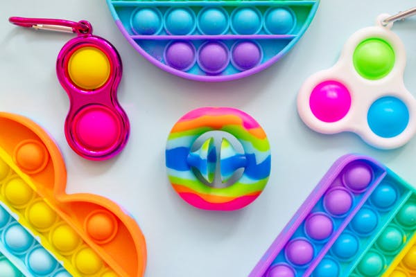 colorful types of pop it fidget toys