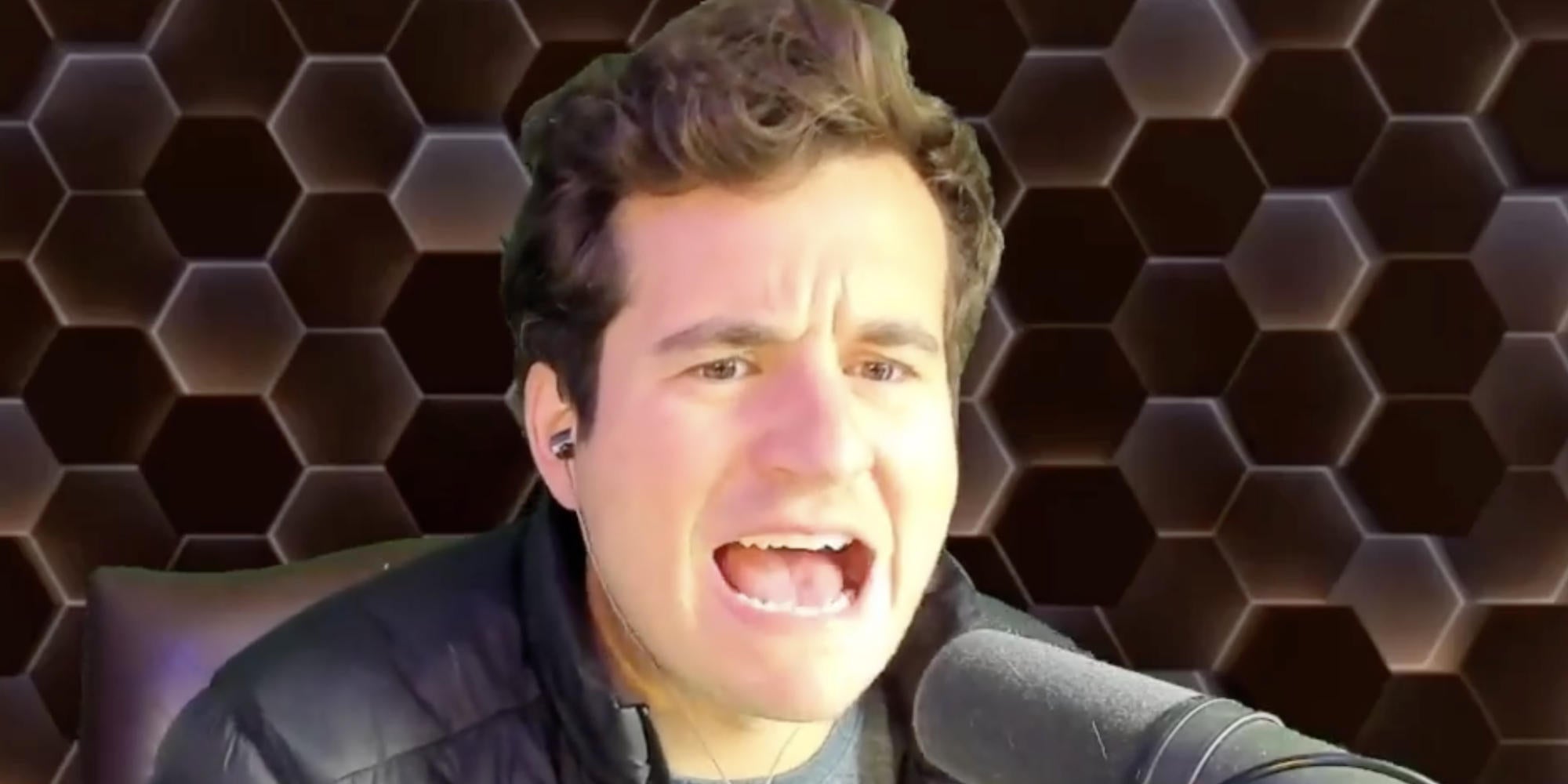 Photo of Alex Stein aka primetimestein yelling into a microphone