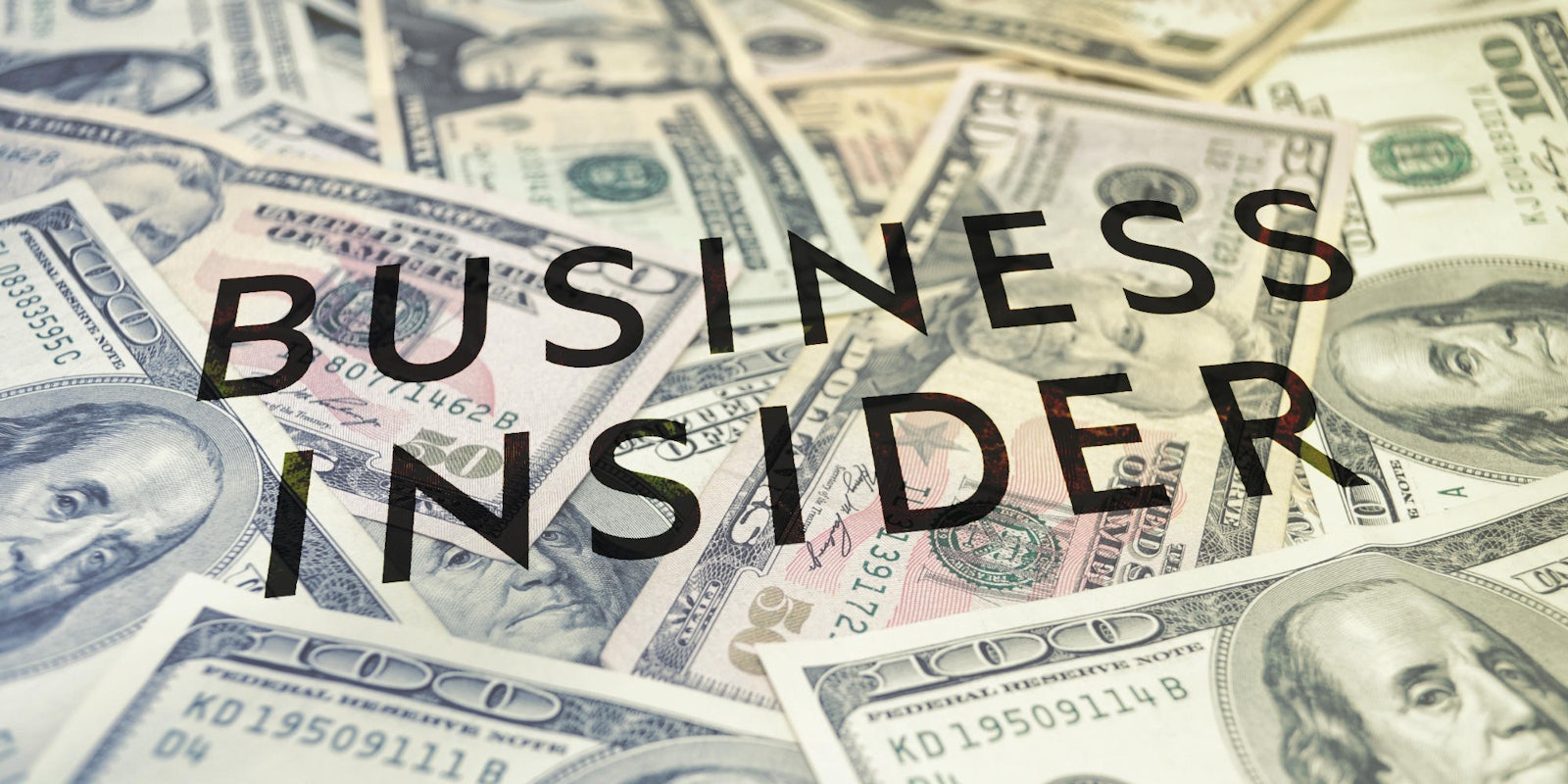 dollar bills with the Business Insider logo on them