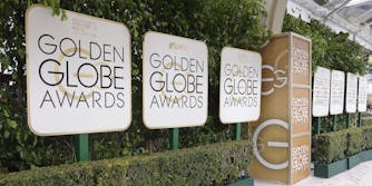 golden globe awards logo on signs at red carpet