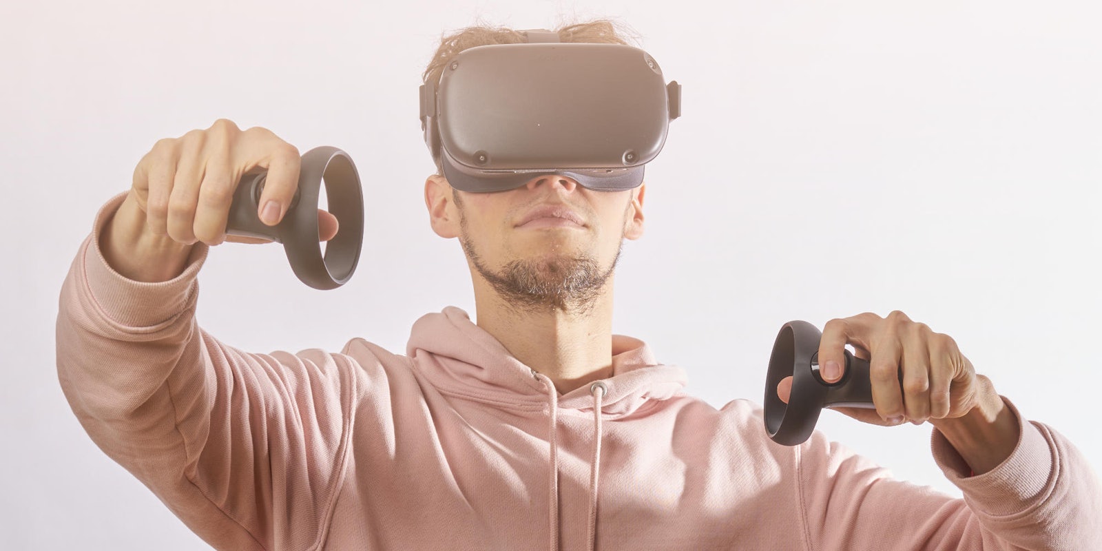 photo of a man using the Oculus VR gaming system