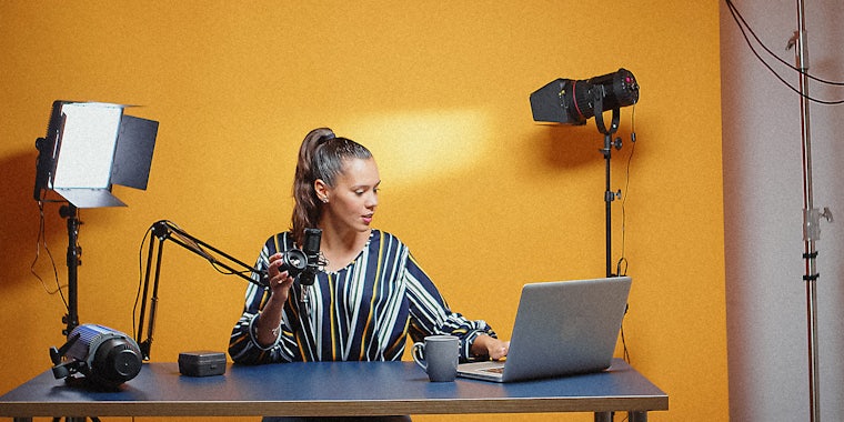 A woman recording a podcast.