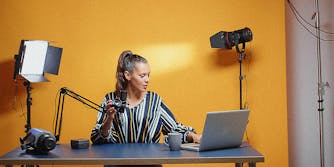 A woman recording a podcast.