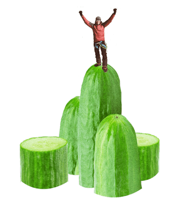 Man standing on cucumber mountains