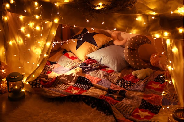 A pillow fort is a great at-home date idea