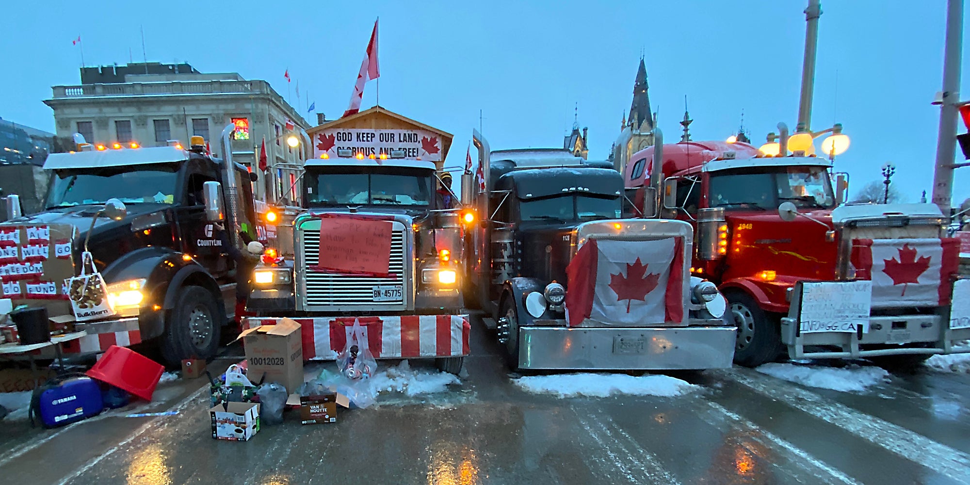 A row of semi trucks.