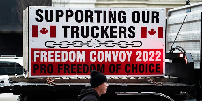 A sign on a truck.