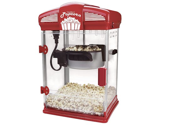a theater popcorn machine full of fresh pop corn