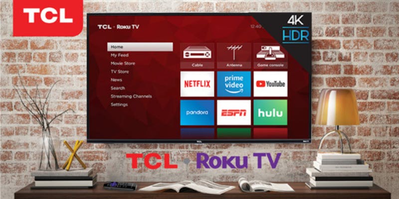 TCL 65-Inch Class-4s Series 4K UHD HDR Smart TV mounted on a brick wall