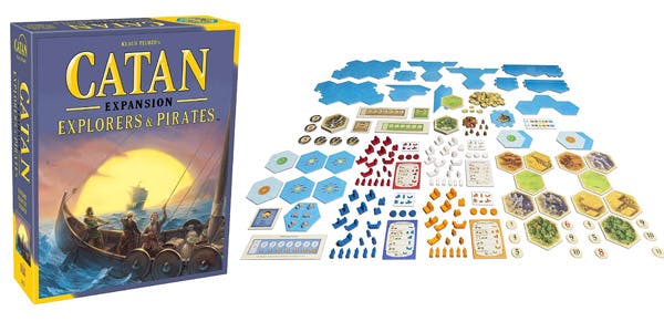Settlers of Catan expansion pack Explorers & Pirates alongside game board and pieces
