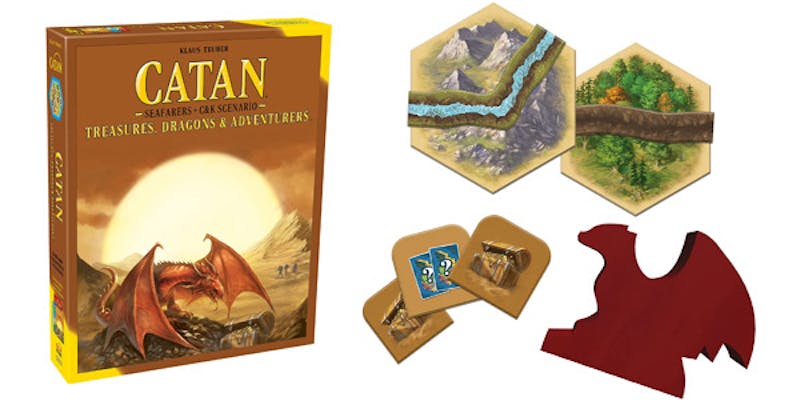 Settlers of Catan expansion pack Treasures, Dragons, & Adventures alongside game board and pieces