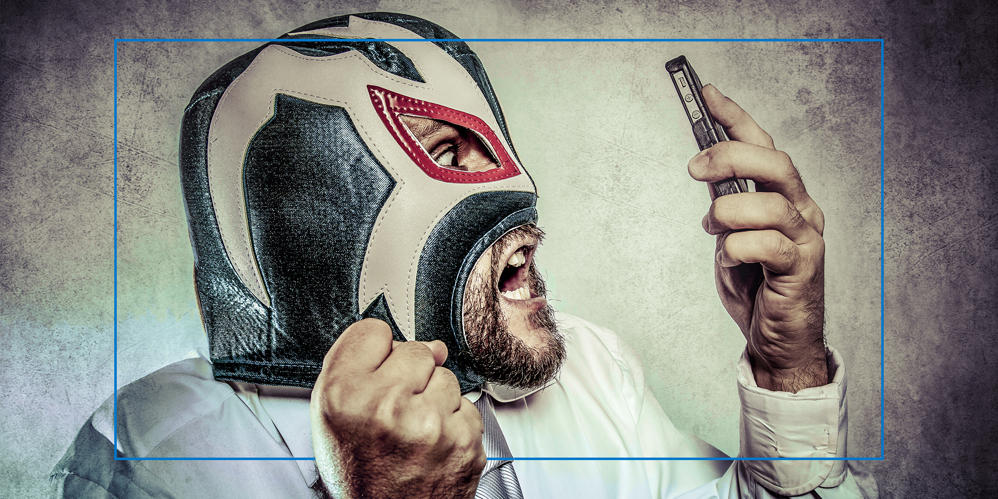 Luchador with phone